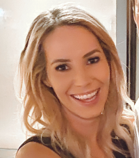 A picture of Christian, she is wearing a black tank top